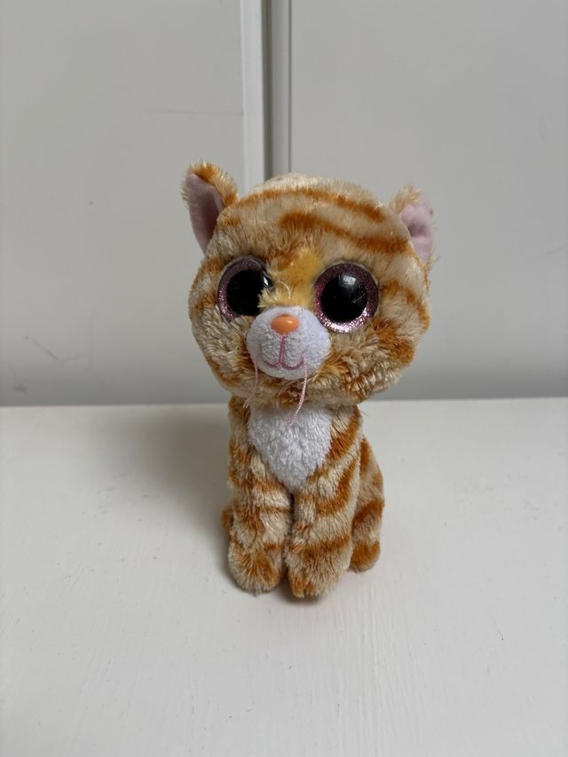 Peluche gato ojos grandes