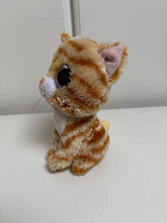 Peluche gato ojos grandes