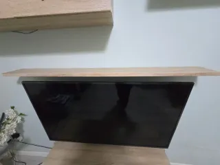 Mueble de salón madera y cristal