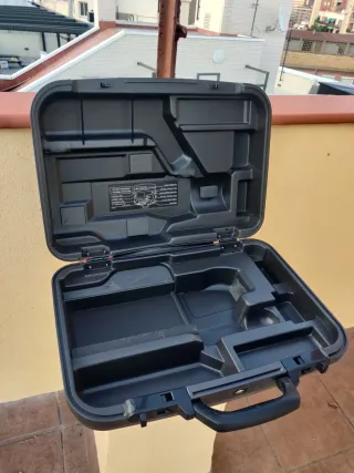 Cámara VHS Hitachi con fundas y cintas