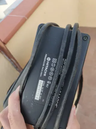 Cámara VHS Hitachi con fundas y cintas