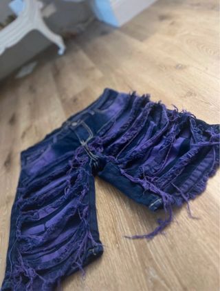 Jeans viola strappati taglia 46/W36