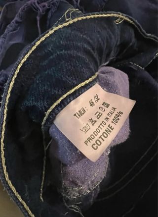 Jeans viola strappati taglia 46/W36
