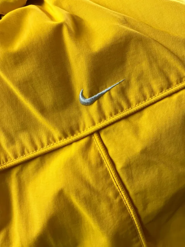 Chaqueta Nike reversible morado/amarillo