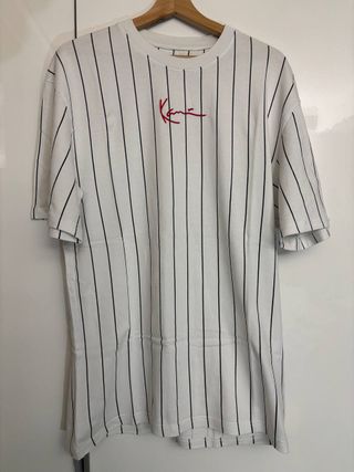Maglietta bianca a righe, buone condizioni, usata