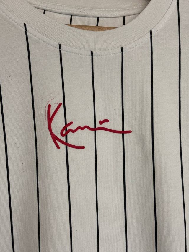 Maglietta bianca a righe, buone condizioni, usata