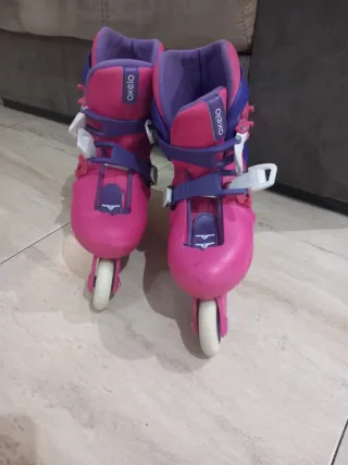Patines niña Oxelo rosas y morados