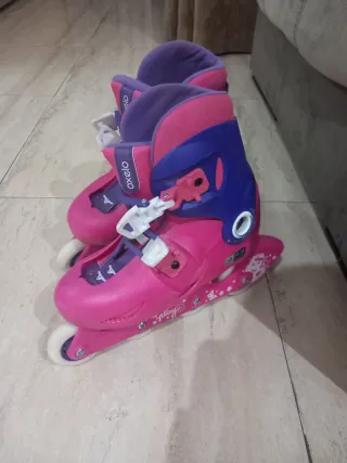 Patines niña Oxelo rosas y morados