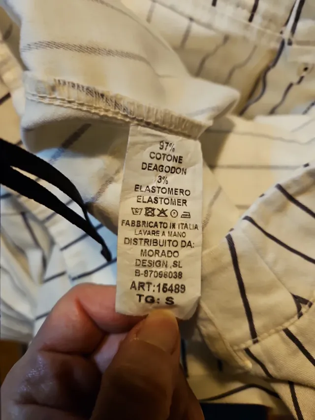 Pantalón beige rayas negro