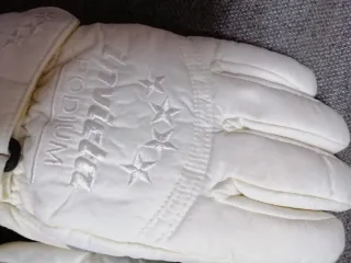 Guantes de esquí naranjas y blancos