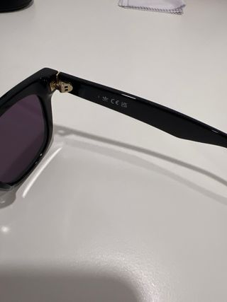 Gafas de sol Adidas negras y doradas Ray Ban