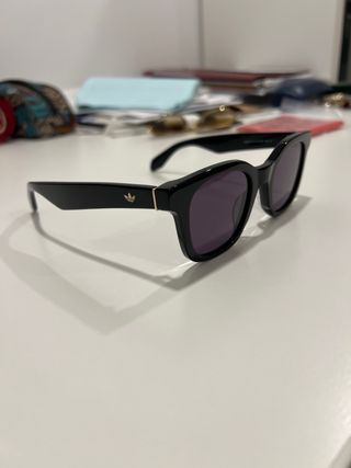 Gafas de sol Adidas negras y doradas Ray Ban