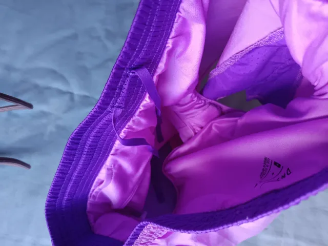 Shorts deportivos Nike chica rosa y morado