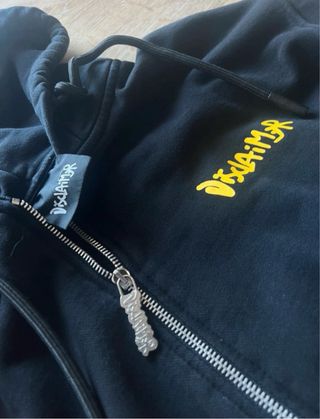 Felpa nera e gialla ottime condizioni come in foto