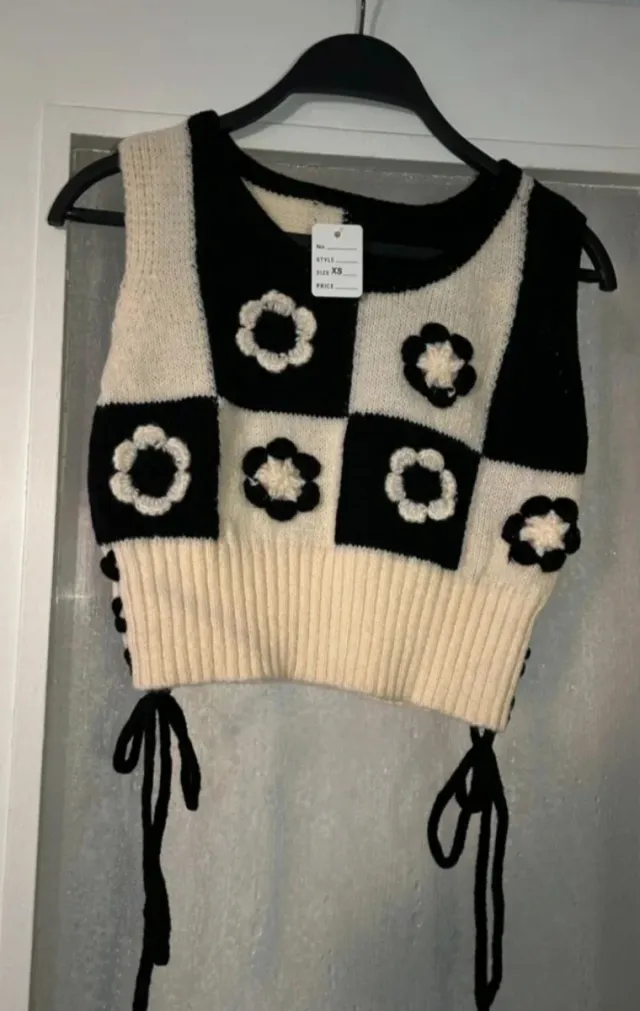 Chaleco de punto con flores