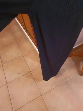 Mono negro elegante da talla