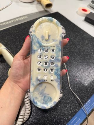 Teléfono fijo pequeño floral beige y azul