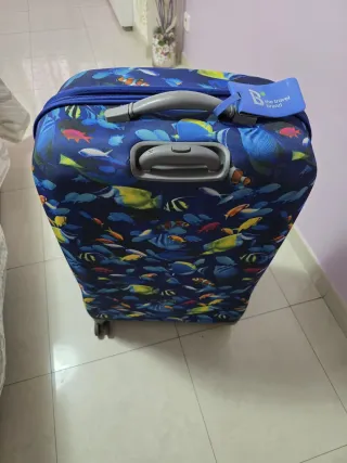 Maleta de viaje con peces