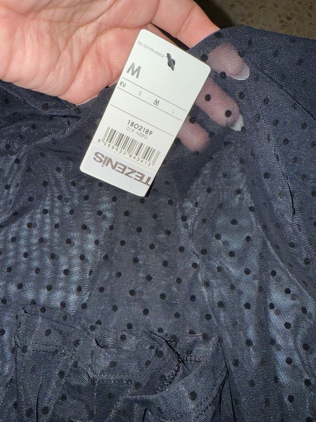 Body manga larga  negra lunares transparente.