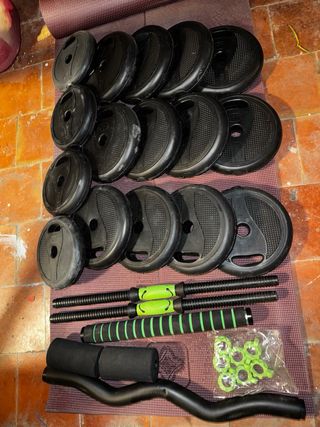 Banco de pesas regulable con discos y barras 40kg.