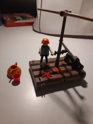 Playmobil náufrago con balsa y accesorios