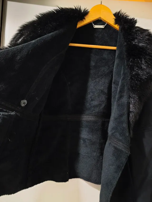 Chaleco suave con cuello de pelo