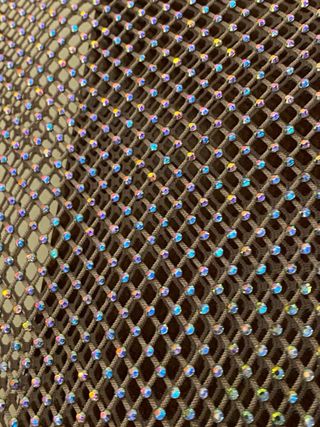 Top de red ZARA plateado talla M.