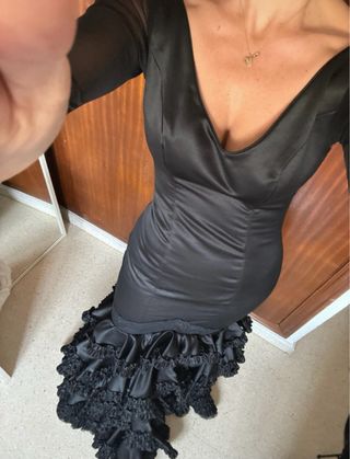 Traje de flamenca negro con volantes