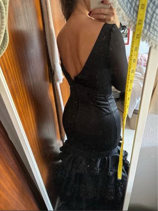 Traje de flamenca negro con volantes