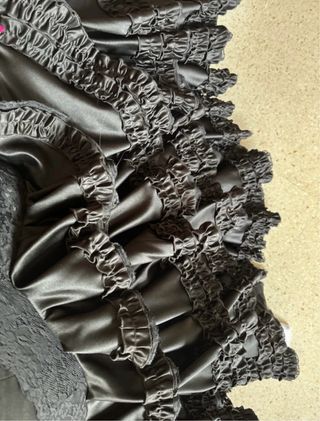 Traje de flamenca negro con volantes