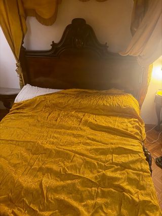 Espléndida cama de caoba con dosel