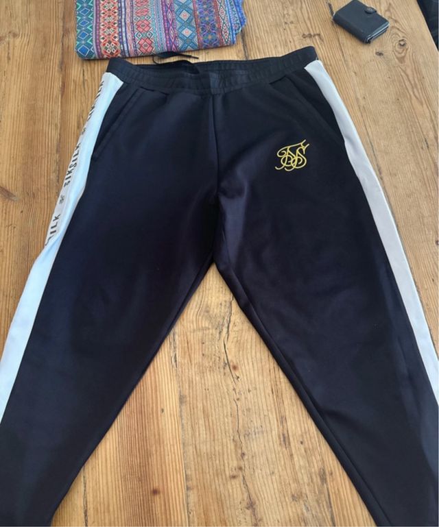 Pantalón chándal SikSilk negro y blanco