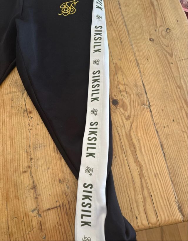 Pantalón chándal SikSilk negro y blanco