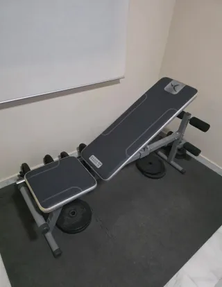 Banco de pesas ajustable y discos