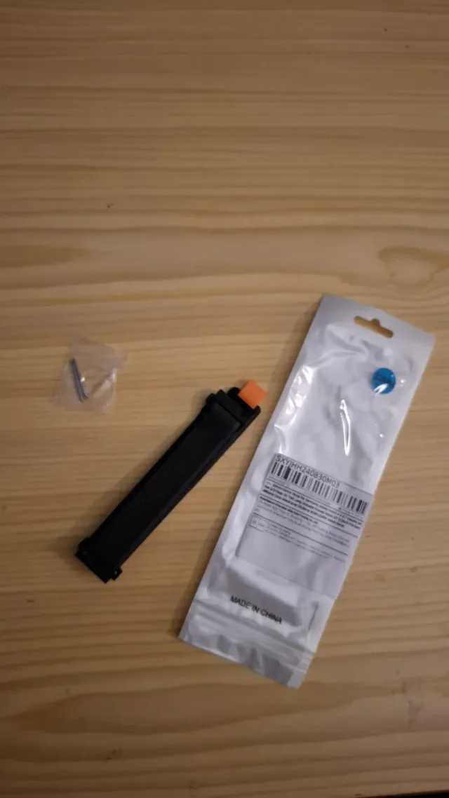 Correa de reloj negra y naranja