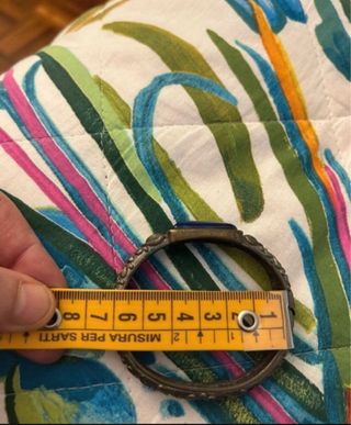 Bracciale rigido blu con dettagli bronzo