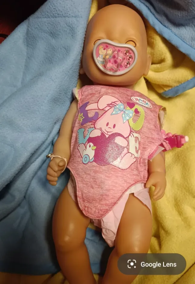 2 Muñecos Baby Born y cunita de tela