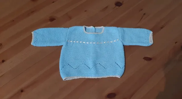 Chaqueta bebé azul tejida