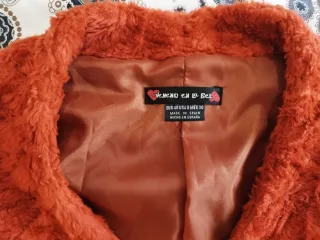 Torera pelo naranja manga larga. Veneno en la piel