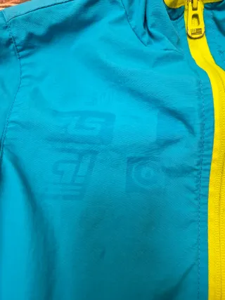 Giubbotto bambino blu con zip lime