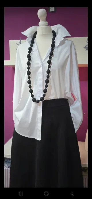 Falda larga antelina negra con bolsillos