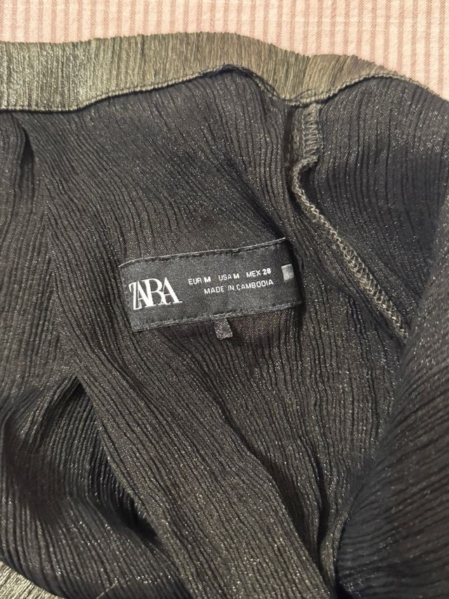 Pantalón fiesta elástico tonos negro/dorado