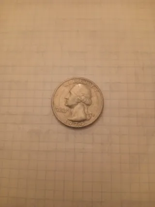 Moneda de 25 centavos de dólar con error