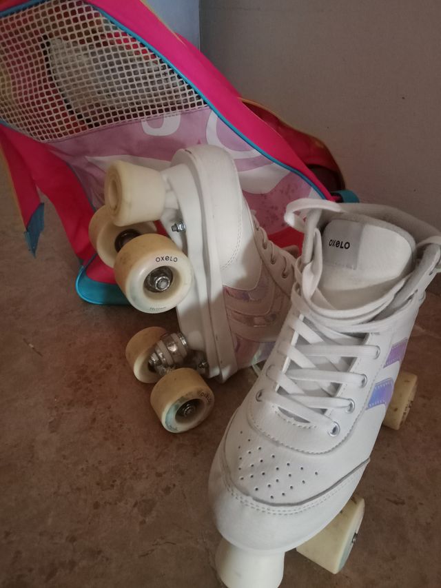 Patines blancos Oxelo con bolsa