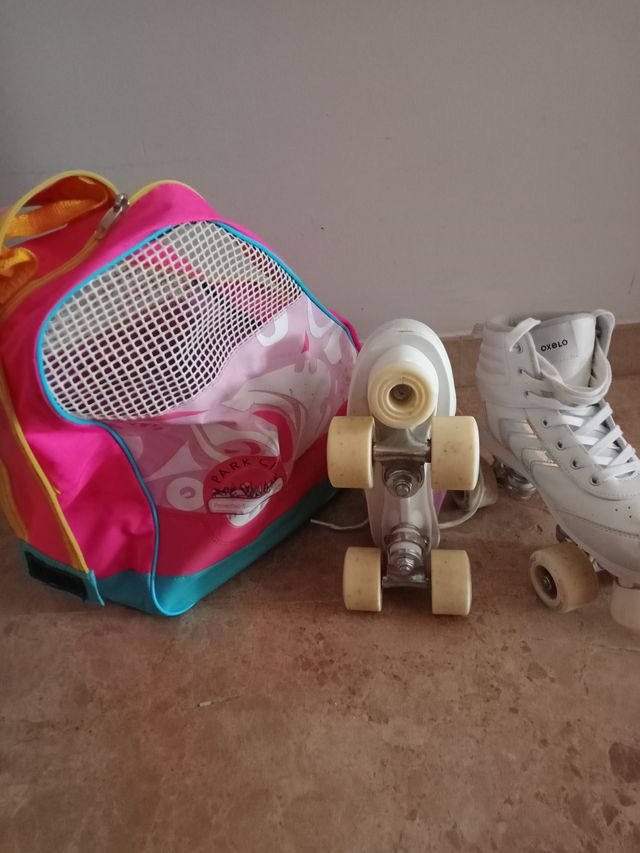 Patines blancos Oxelo con bolsa