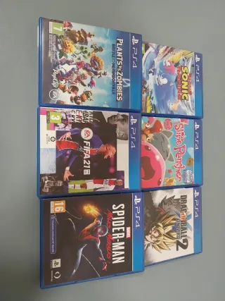 PS4 + Mando + 6 Juegos
