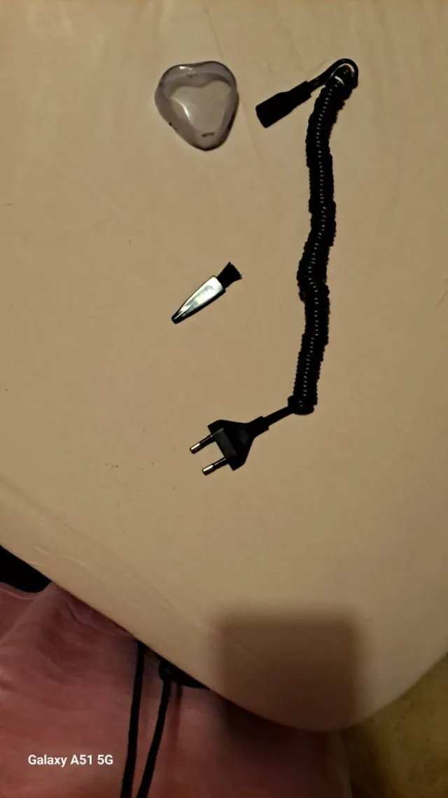 Máquina de afeitar Philips azul y plateada