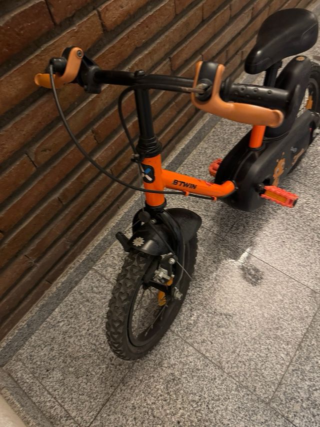 Bicicleta infantil Decathlon naranja 4-6 años