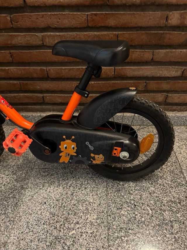 Bicicleta infantil Decathlon naranja 4-6 años