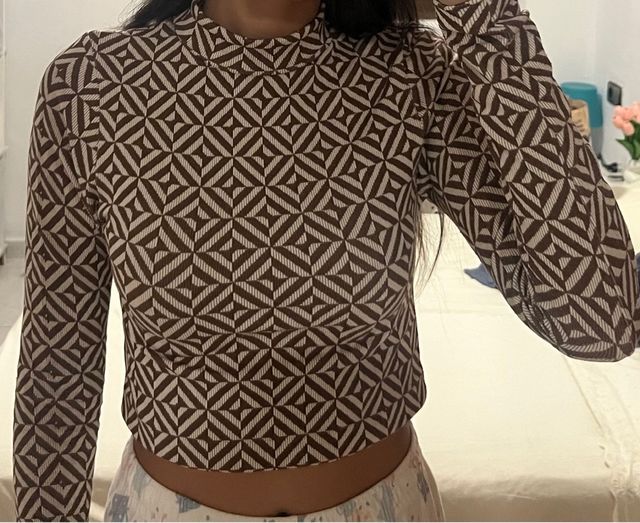 Top estampado geométrico manga larga